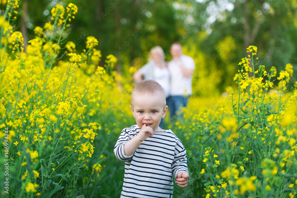 Family rest on the rape field. Family rest on the rape field.