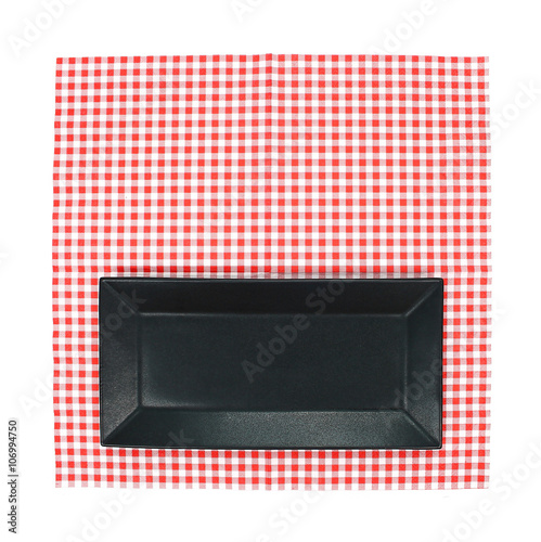 Top view plate on red tablecloth texture