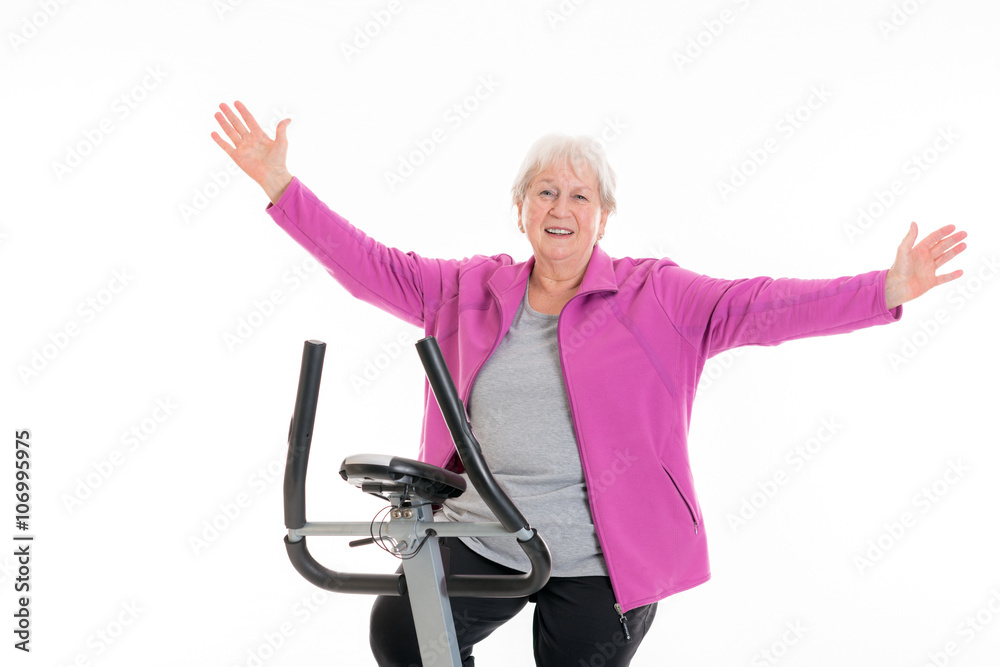 female senior with arms up train with fitness machine female senior with arms up train with fitness machine