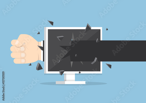 Businessman hand throw a punch through monitor screen