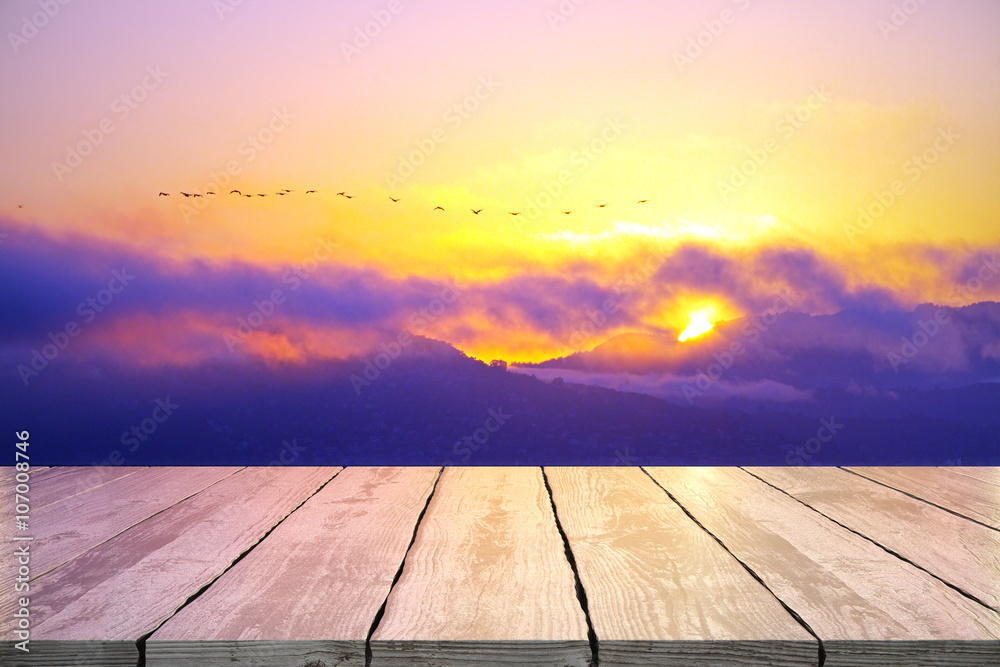 Empty table on sunset background