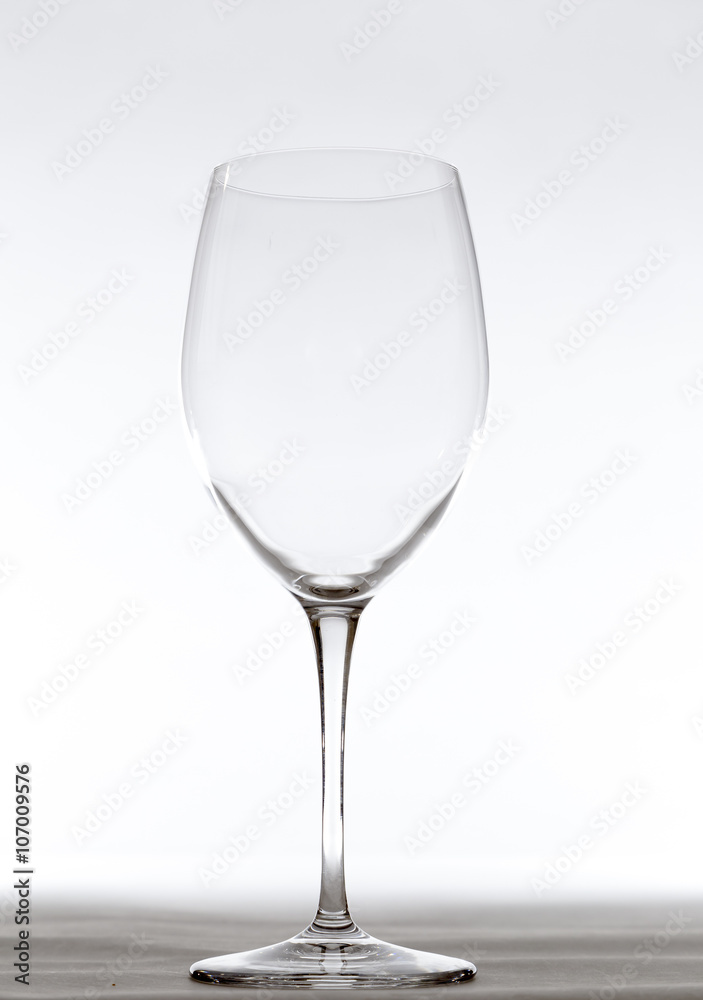Wine Glass Empty on bright background Wine Glass Empty on bright background