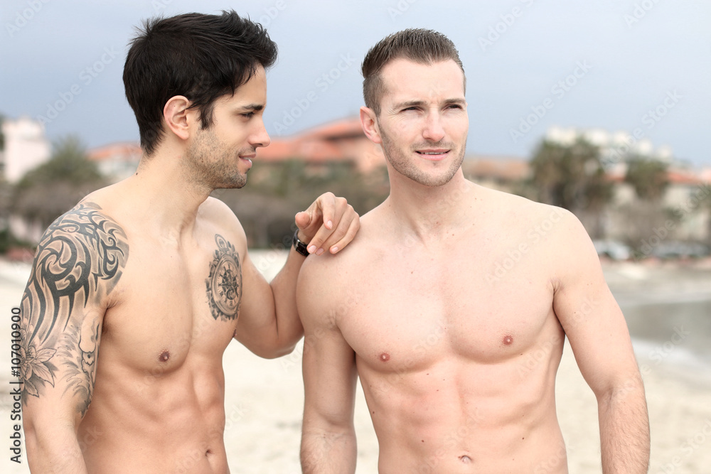 sexy men - two handsome guys on the beach foto de Stock | Adobe Stock