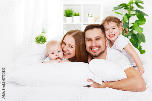 happy family at home in  the bed © JenkoAtaman