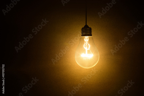 light bulb on dark background photo