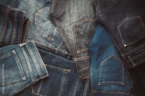 Fototapeta Fashion different jeans background. Retro toned.