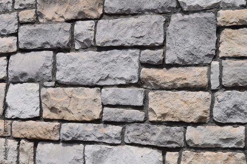 Beige and Gray Brick Wall / Sturdy construction of a wall using masonry. Also makes a great background.