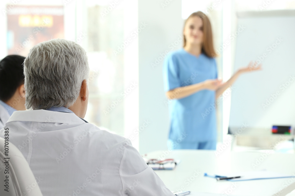 Doctors meeting in office