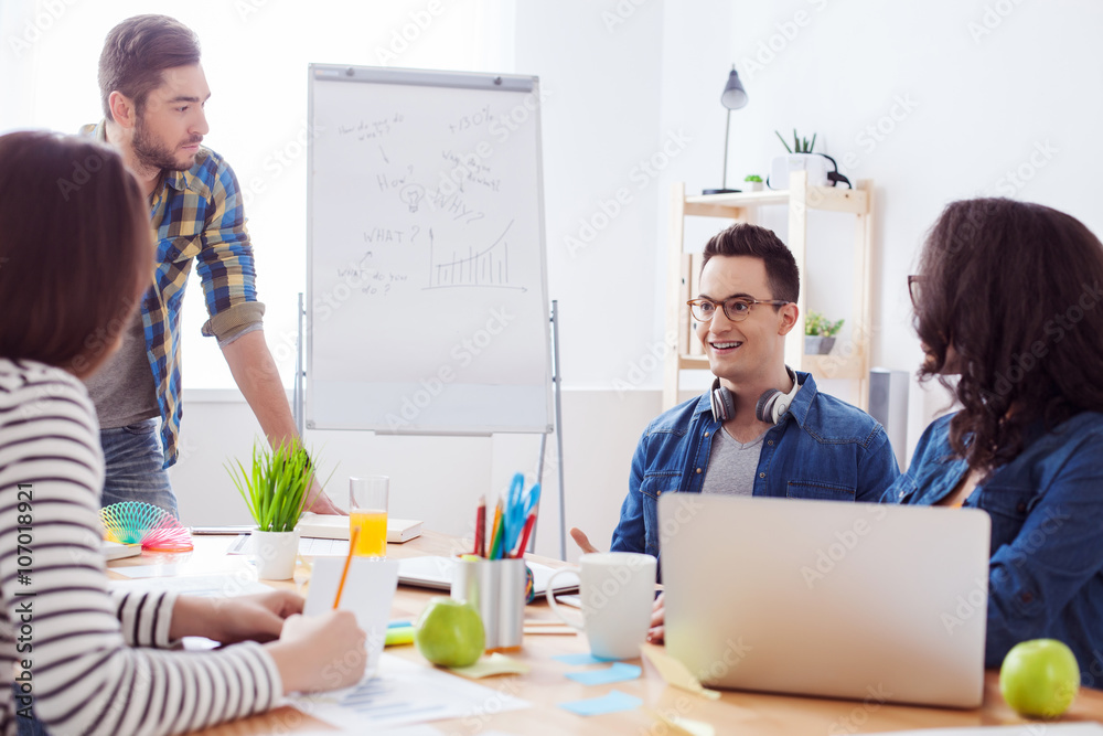 Skillful four freelancers are discussing new project