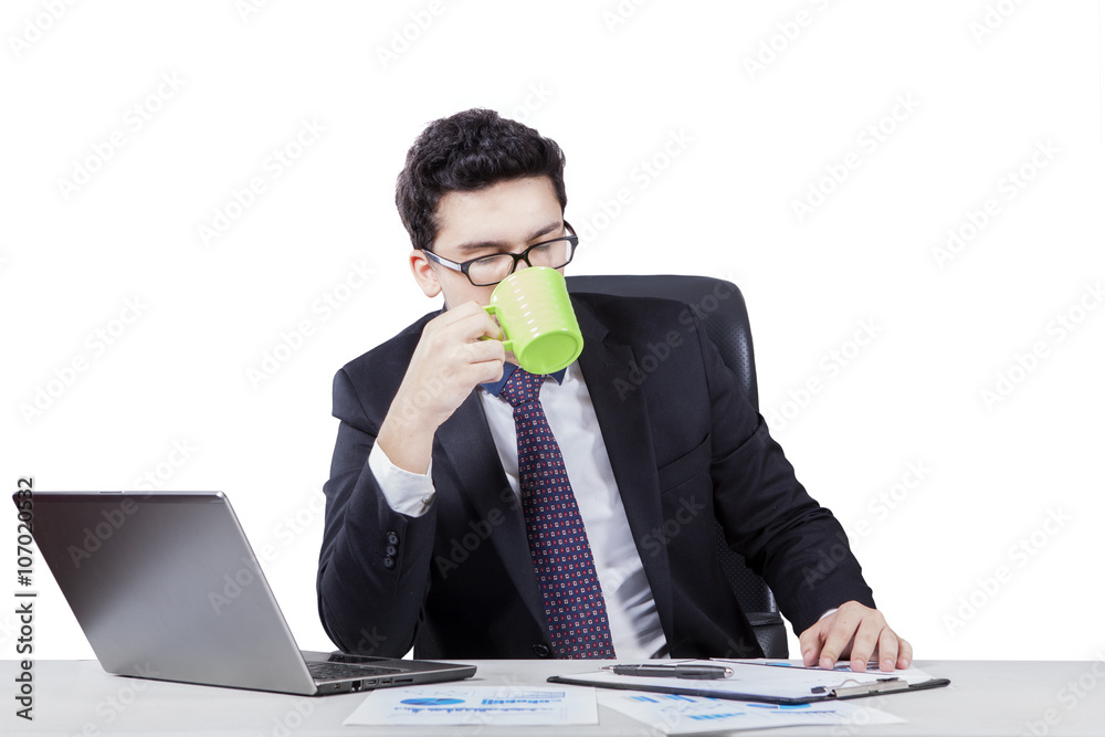 Arabic businessman enjoy coffee and working Arabic businessman enjoy coffee and working