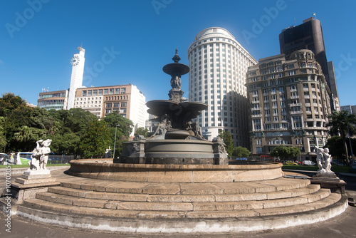 Fountain in Gandhi Square in Rio de Janeiro and City Downtown Buildings