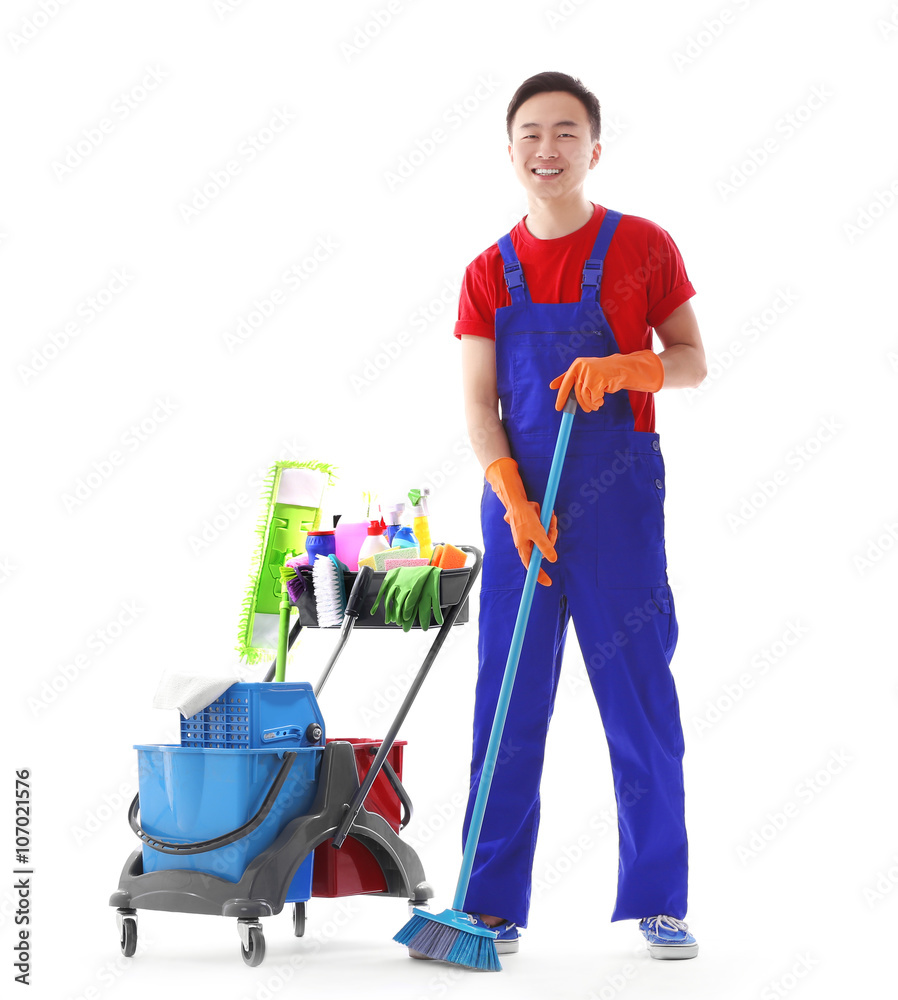 Young smiling male cleaner isolated on white Young smiling male cleaner isolated on white