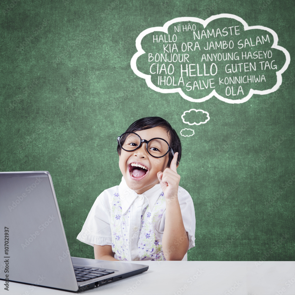 Joyful student learn multi language with laptop Joyful student learn multi language with laptop