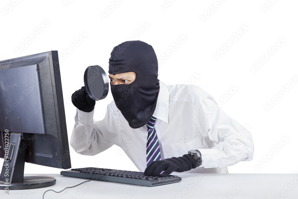 Thief using magnifier to steal information Thief using magnifier to steal information