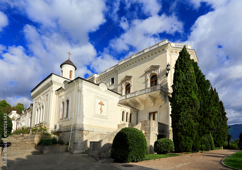 Orthodox church near white palace