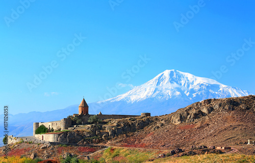 Landscape with an ancient monastery photo