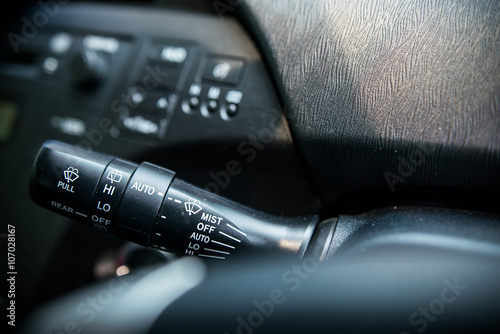 Car interior detail ; Wipers control buttons close up car wiper control swicth
 photo