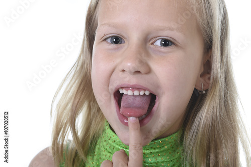 cute little girl pointing her tongue in body parts learning school chart serie