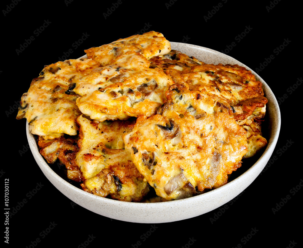 Chicken cutlets on black background Chicken cutlets on black background