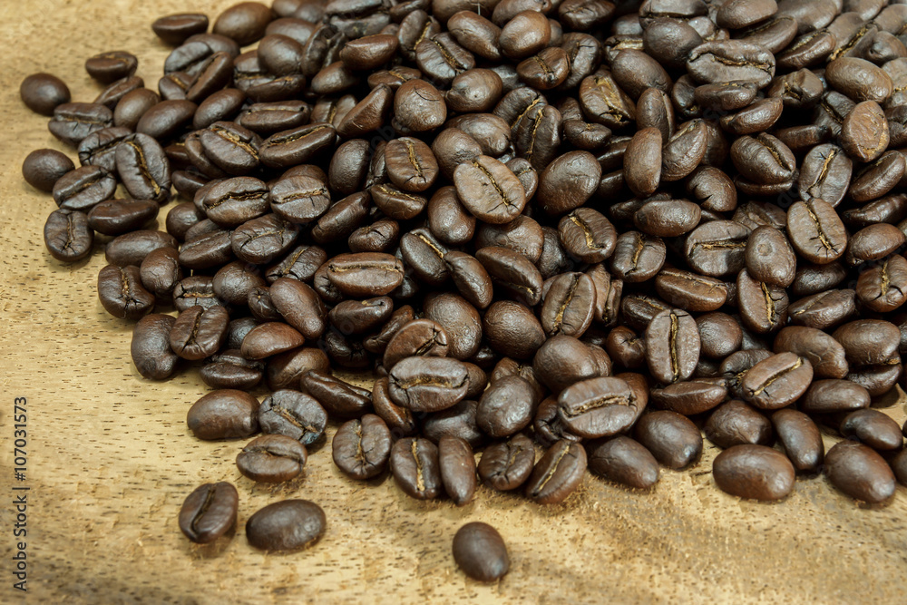 Coffee bean on wood background Coffee bean on wood background