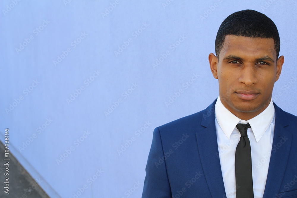 African American businessman in a blue suit with copy space for adding text African American businessman in a blue suit with copy space for adding text