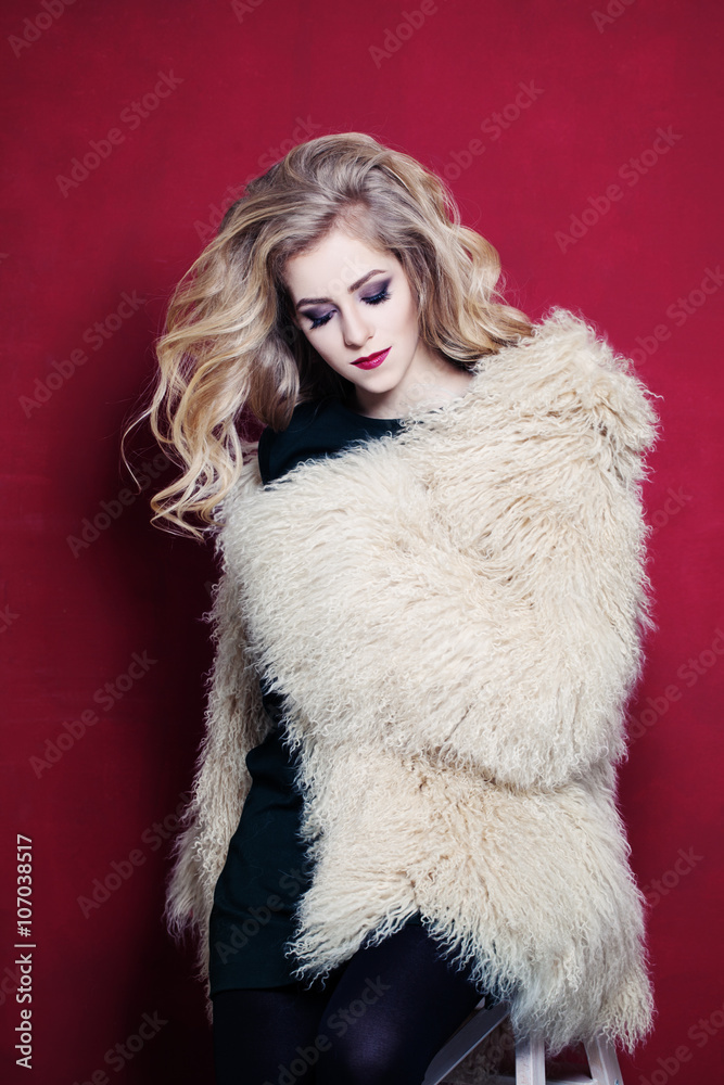 Pretty Woman with Blonde Hair Wearing Fashion Fur Coat Pretty Woman with Blonde Hair Wearing Fashion Fur Coat