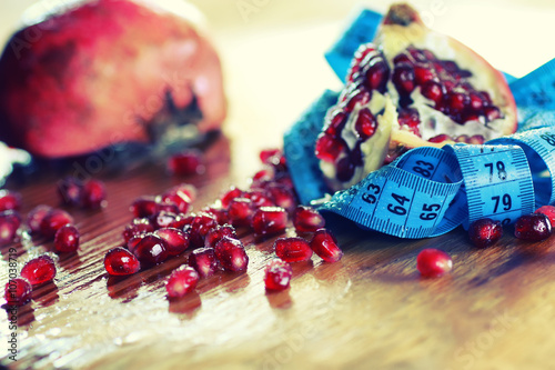 diet mesaure fruit red pomegranate photo