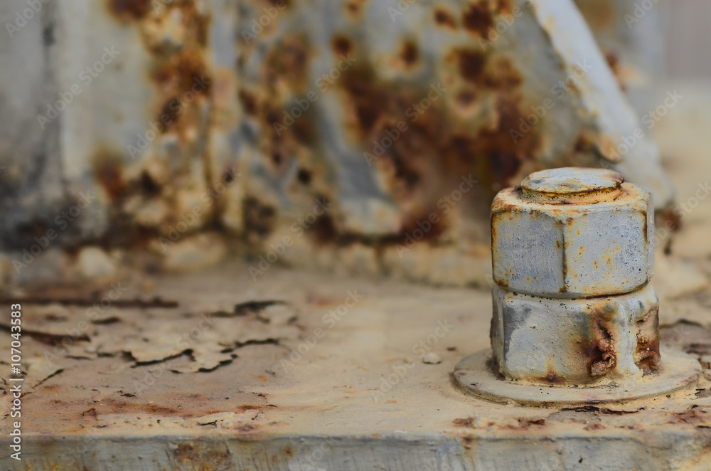 Big rusty metal nuts locked Big rusty metal nuts locked