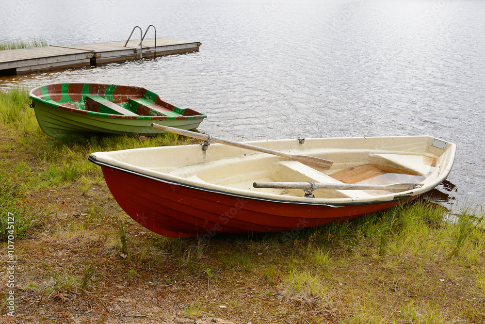 Naklejka premium Boats after rain. Northern Finland