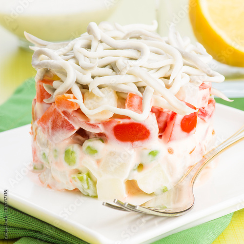 Russian cake salad with mayonnaise and tomatoes gulas