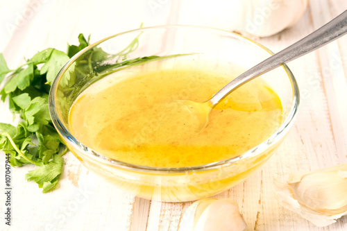 vinaigrette sauce in glass bowl