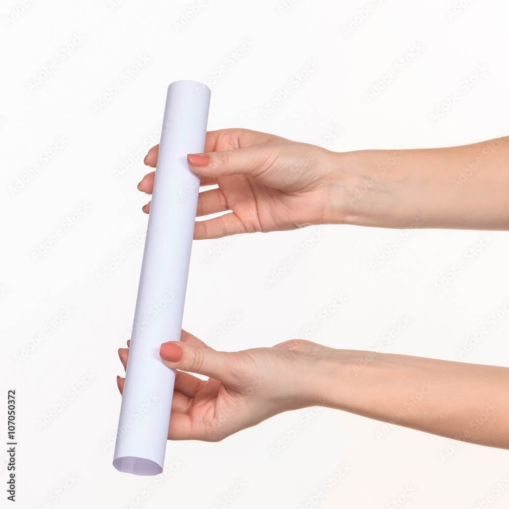 The cylinder female hands on white background The cylinder female hands on white background