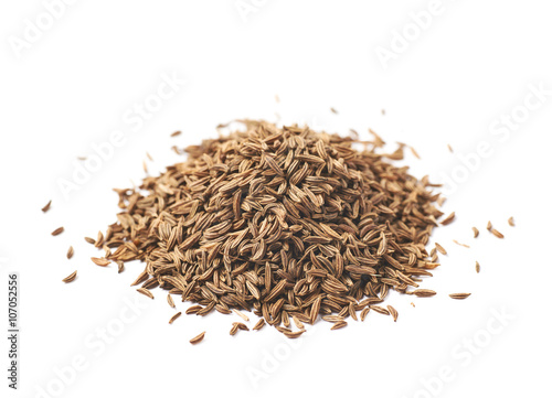 Pile of cumin seeds isolated