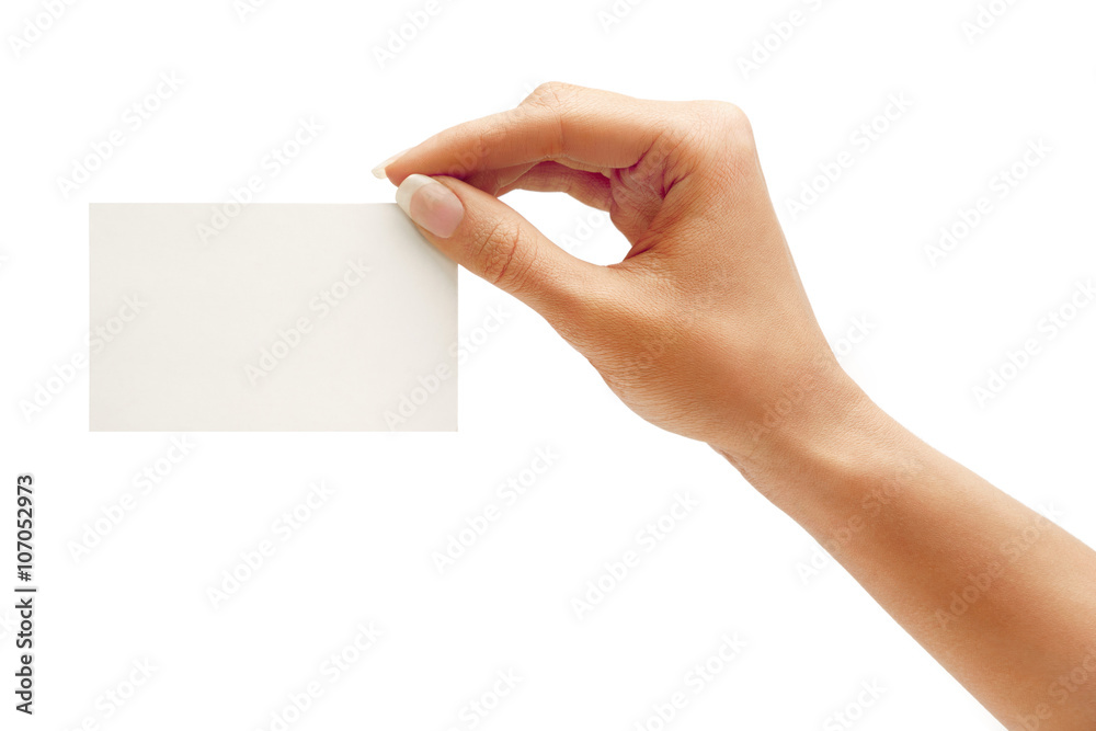 Fototapeta premium Woman's hand holding business card isolated on white background. Close up