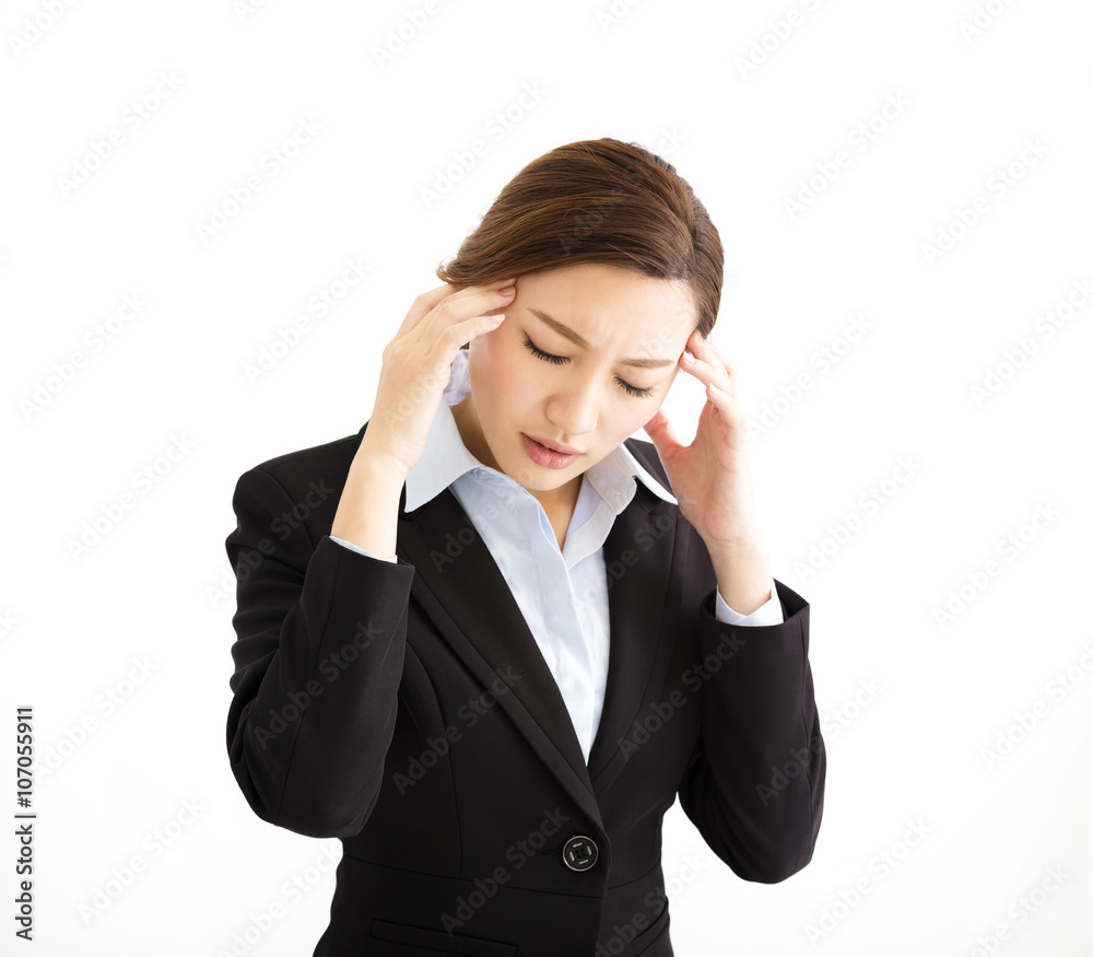 Stressed out businesswoman with headache Stressed out businesswoman with headache