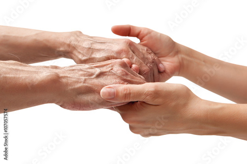 Konstfotografi Hands of an elderly man holding the hand of a younger woman