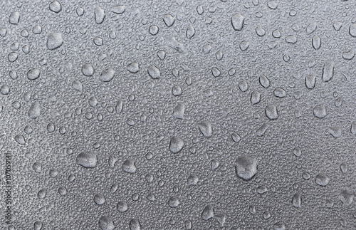 water drops on a metallic surface