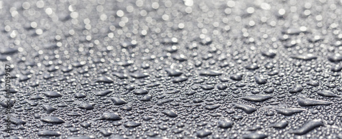 water drops on a metallic surface