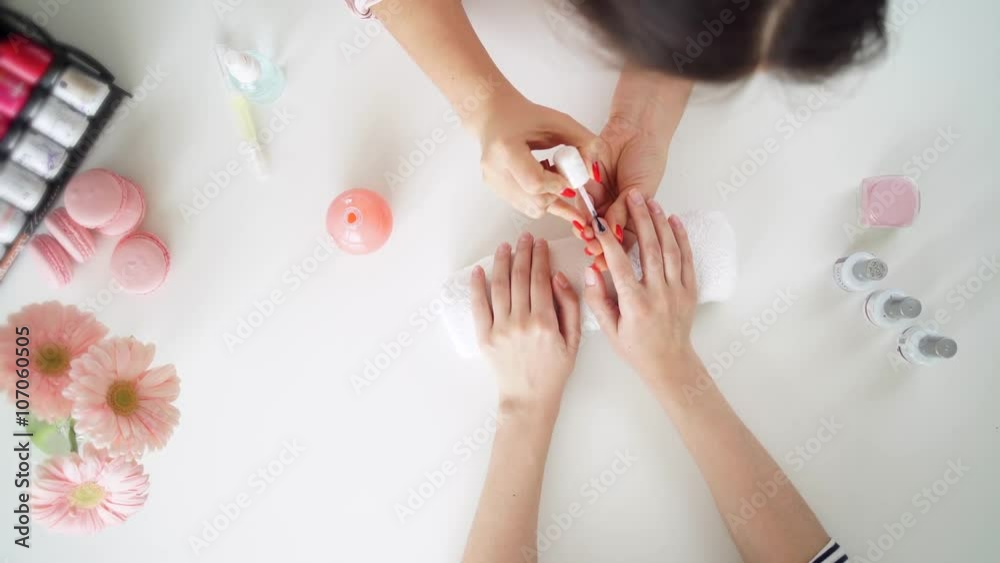 Nails saloon woman nail polish remove with tissue for new manicure
