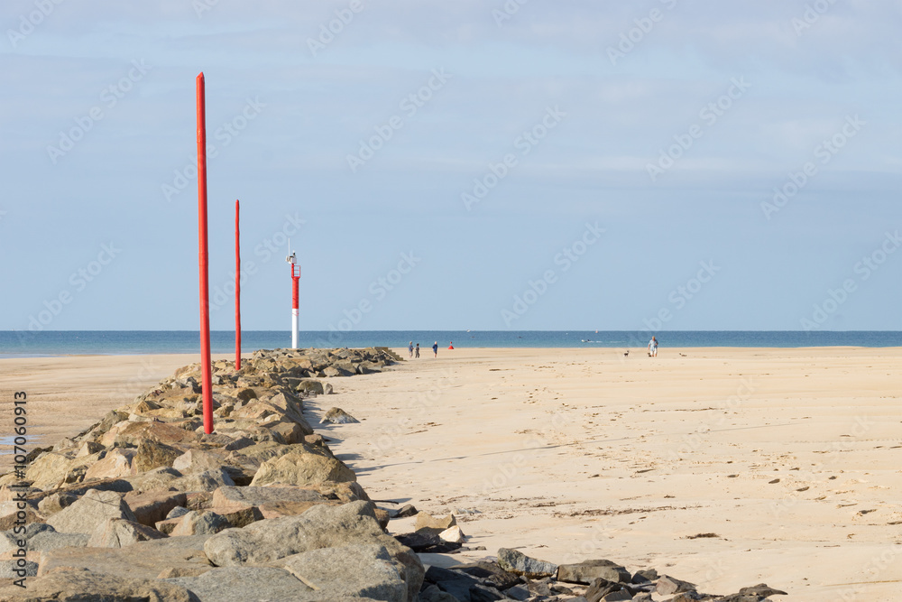 on the Beach of Portbail, Normandy, France at low tide on the Beach of Portbail, Normandy, France at low tide