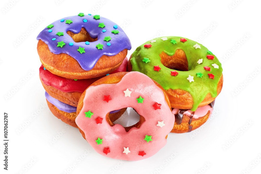 Donuts with colored glaze isolated on white background. Donuts with colored glaze isolated on white background.