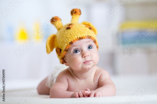 baby child in costume of giraffe