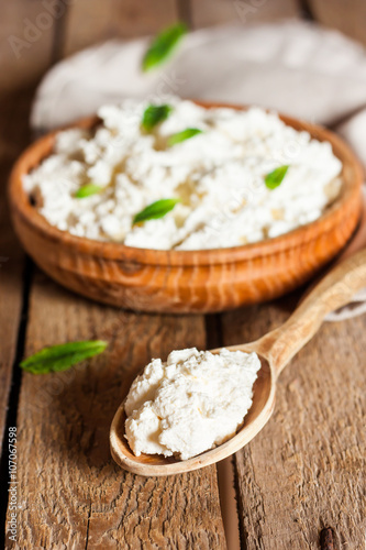 cottage cheese in a wooden bowl