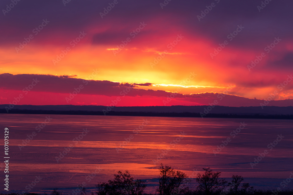 Beautiful sunset light on winter lake