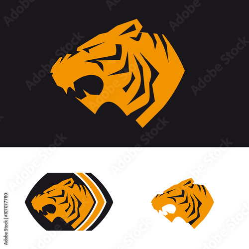 Fototapeta Naklejka Na Ścianę i Meble -  Head of tiger is a logo template for the corporate identity of the company's business, sports club, brand of clothing or equipment. The tiger growls, opened its toothy mouth. Male serious logo.