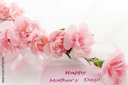 Mother's day card. Bouquet of pink carnations.