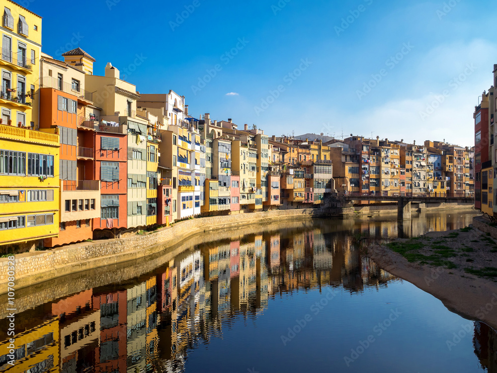 Colorful houses reflected in water, Girona, Catalonia, Spain