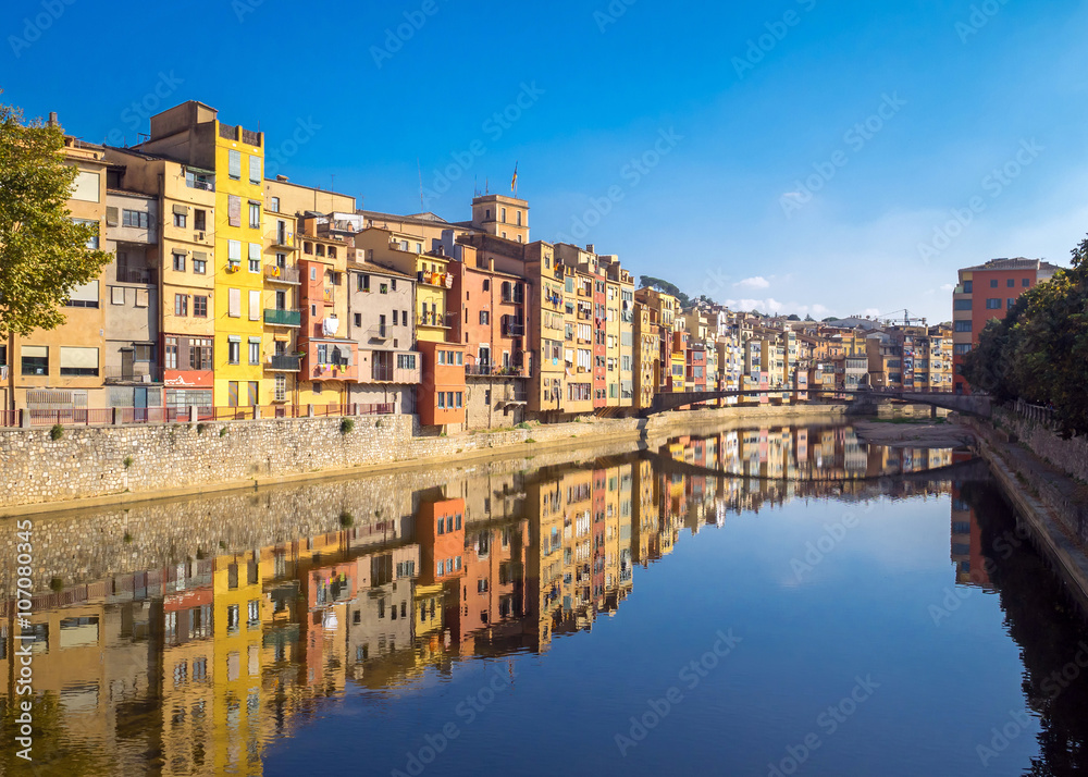 Colorful houses reflected in water, Girona, Catalonia, Spain