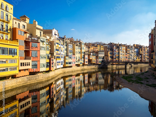 Colorful houses reflected in water  Girona  Catalonia  Spain