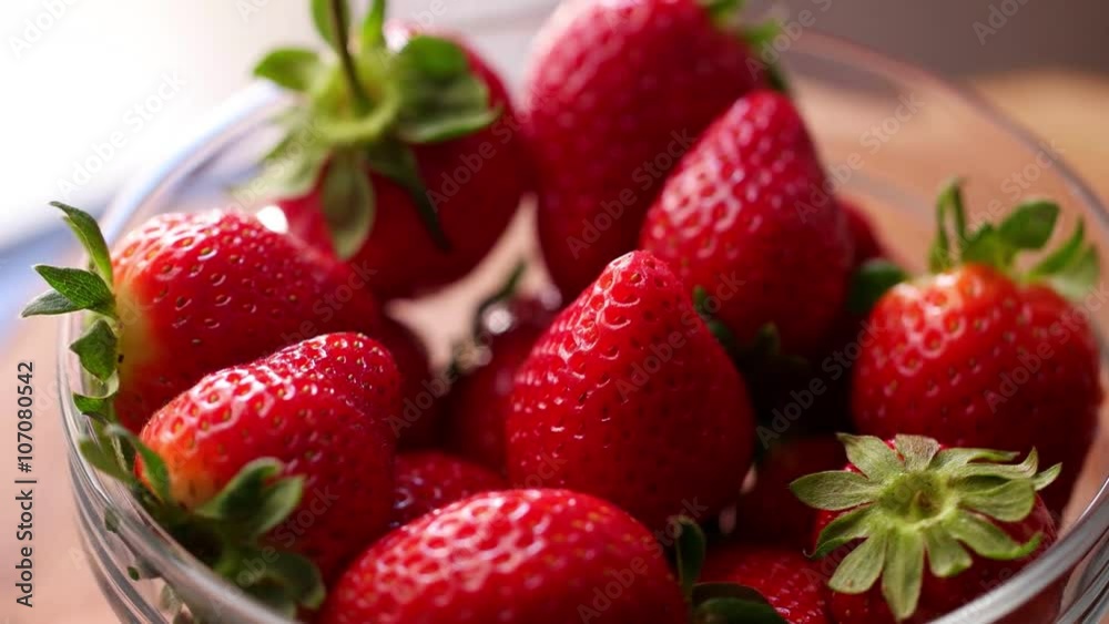 Fresh strawberries rotating with sunlight. Fresh strawberries rotating with sunlight.